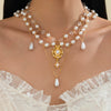 Wholesale Women's Imitation Pearl Tassel Necklace With Alloy Pendant Drop Shape Electroplated Metal Hollow Design