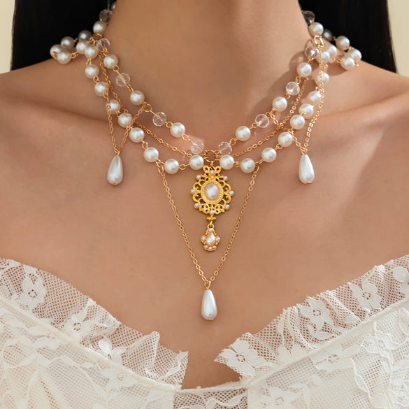 Wholesale Women's Imitation Pearl Tassel Necklace With Alloy Pendant Drop Shape Electroplated Metal Hollow Design
