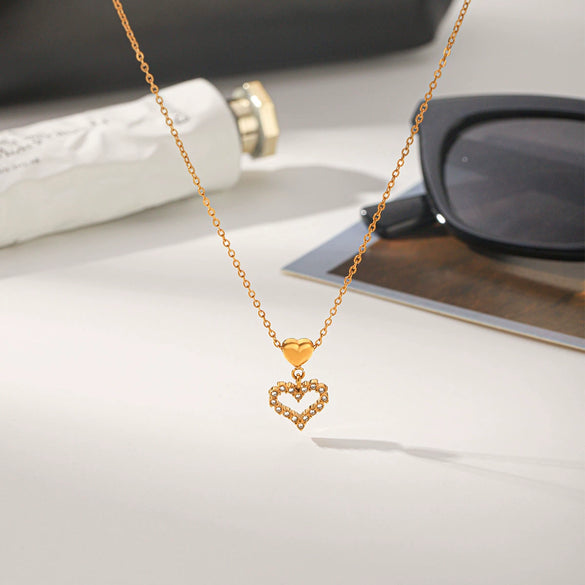 Wholesale Women's Ins Style Gold Plated Geometric Titanium Steel And Stainless Steel Necklace With Hollow Heart Pendant