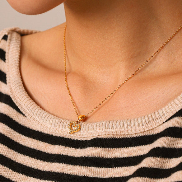 Wholesale Women's Ins Style Gold Plated Geometric Titanium Steel And Stainless Steel Necklace With Hollow Heart Pendant
