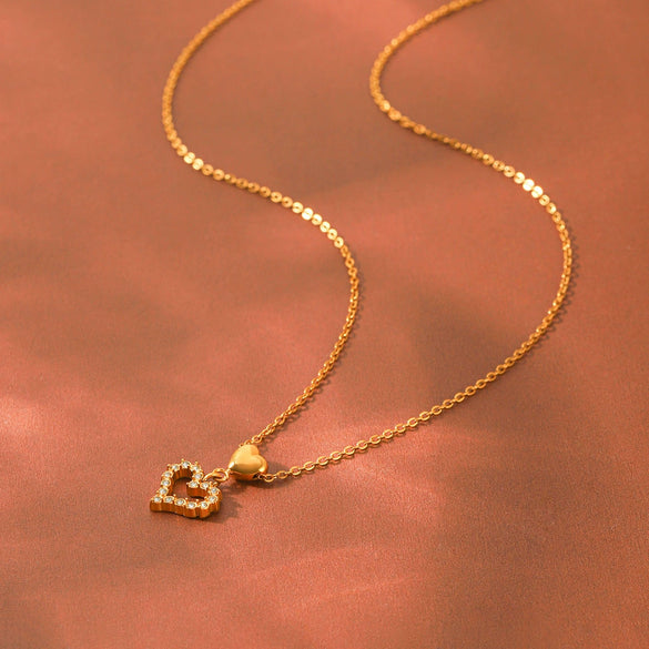 Wholesale Women's Ins Style Gold Plated Geometric Titanium Steel And Stainless Steel Necklace With Hollow Heart Pendant