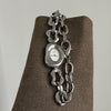 Wholesale Women's Irregular Heart Shape Alloy Metal Hollow Bracelet Pointer Watch With Fashionable Stylish Design