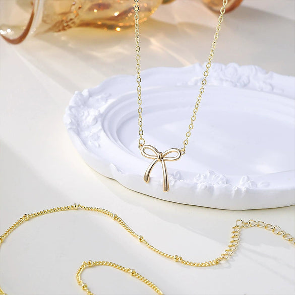 Wholesale Women's Jewelry Copper Plated Real Gold Bow Necklace