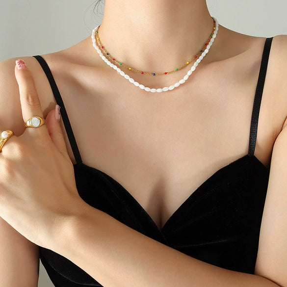 Wholesale Women's Jewelry French Retro Style Overlapping Oil Dripping Titanium Steel Chain With White Yellow Shell Pendant Electroplated Geometric Design Necklace