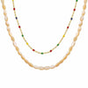 Wholesale Women's Jewelry French Retro Style Overlapping Oil Dripping Titanium Steel Chain With White Yellow Shell Pendant Electroplated Geometric Design Necklace