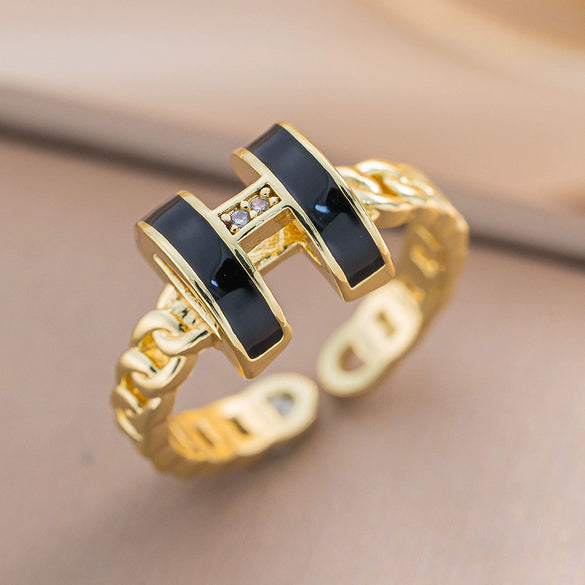 Wholesale Women's Jewelry Trendy Black H Ring Hollow Titanium Steel Jewelry With Diamond Design And Vacuum Furnace Electroplating