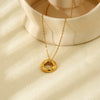 Wholesale Women's 18K Gold Plated Stainless Steel Geometric Necklace With Inlaid Zircon And Hollow Ring Pendant