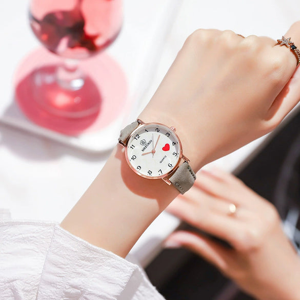 Wholesale Women's Leisure Quartz Watch With Metal Case Imitation Leather Strap And Round Dial