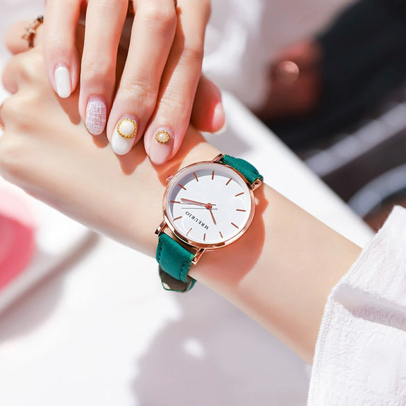 Wholesale Women's Leisure Quartz Watch With Metal Case Imitation Leather Strap And Round Dial