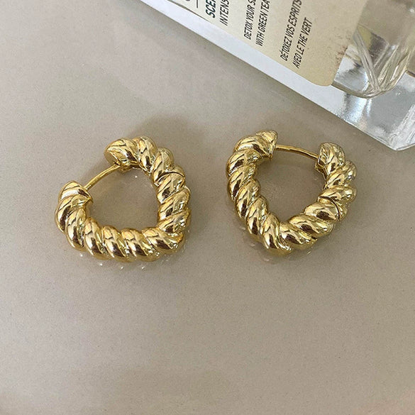 Wholesale Women's Light Luxury Alloy Heart Twist Love Earrings With Gold Plating Electroplating