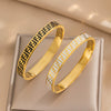 Wholesale Women's Light Luxury Classic Vintage Letter Glowly Star Bracelet Titanium Steel With Dripping Oil Treatment