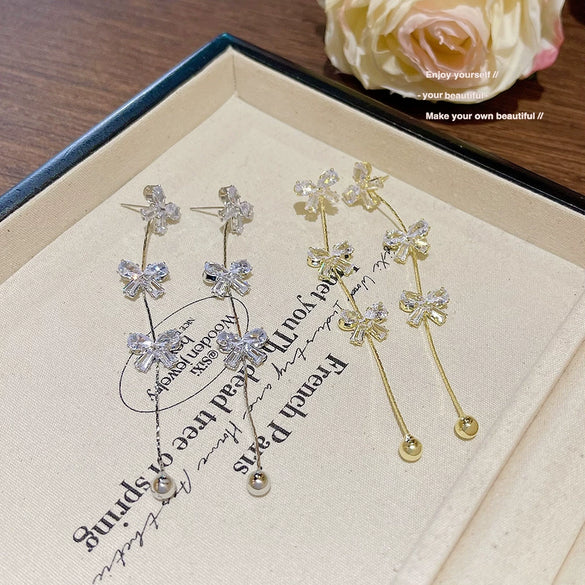 Wholesale Women's Light Luxury Copper Bow Tassel Earrings With Zirconia