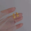 Wholesale Women's Light Luxury Copper Electroplated Flower Shaped Earrings With Silver Needle Sequins