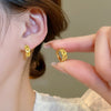 Wholesale Women's Light Luxury Copper Electroplated Flower Shaped Earrings With Silver Needle Sequins