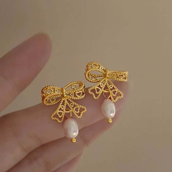Wholesale Women's Light Luxury Copper Electroplated Flower Shaped Earrings With Silver Needle Sequins