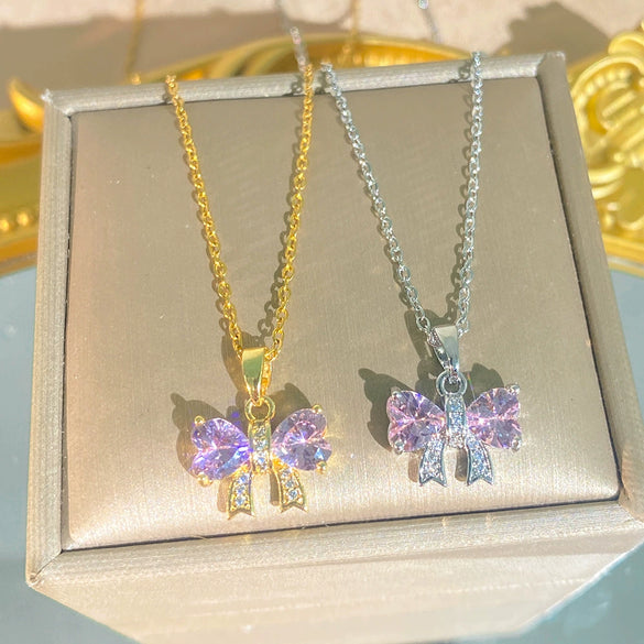 Wholesale Women's Light Luxury Diamond Pink Bow Titanium Steel Oshaped Chain Necklace With Copper Pendant Inlaid With Zircon