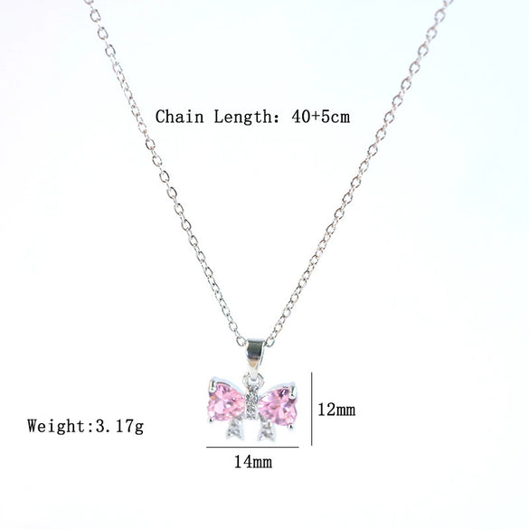 Wholesale Women's Light Luxury Diamond Pink Bow Titanium Steel Oshaped Chain Necklace With Copper Pendant Inlaid With Zircon
