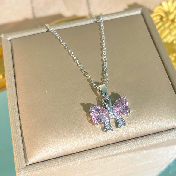 Wholesale Women's Light Luxury Diamond Pink Bow Titanium Steel Oshaped Chain Necklace With Copper Pendant Inlaid With Zircon