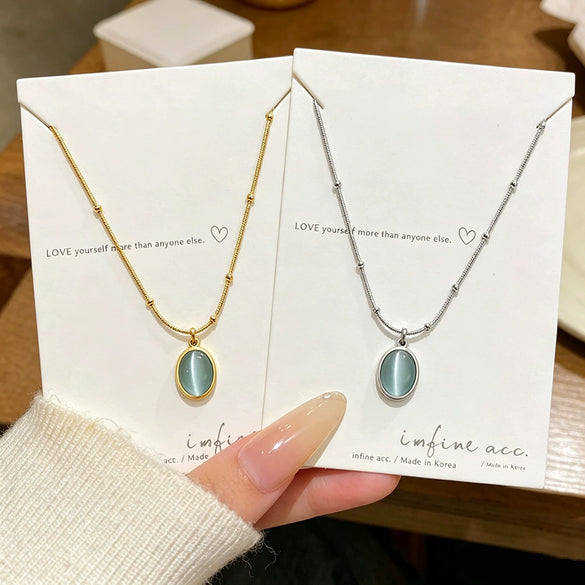 Wholesale Women's Light Luxury Geometric Cat's Eye Stone Titanium Steel Necklace With Zirconia Design And 18K Vacuum Electroplating