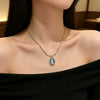 Wholesale Women's Light Luxury Geometric Cat's Eye Stone Titanium Steel Necklace With Zirconia Design And 18K Vacuum Electroplating