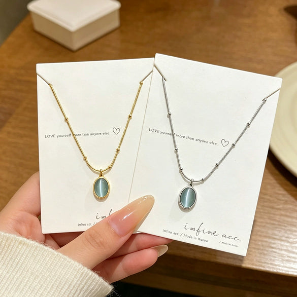 Wholesale Women's Light Luxury Geometric Cat's Eye Stone Titanium Steel Necklace With Zirconia Design And 18K Vacuum Electroplating
