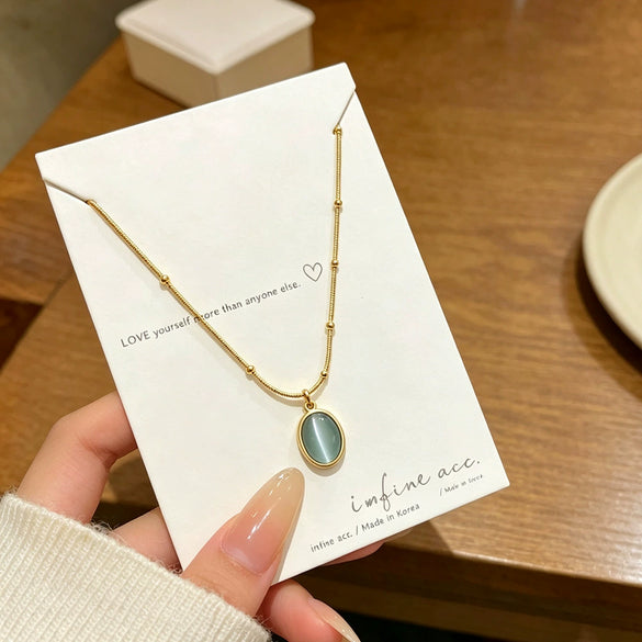 Wholesale Women's Light Luxury Geometric Cat's Eye Stone Titanium Steel Necklace With Zirconia Design And 18K Vacuum Electroplating