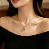 Wholesale Women's Light Luxury Geometric Cat's Eye Stone Titanium Steel Necklace With Zirconia Design And 18K Vacuum Electroplating