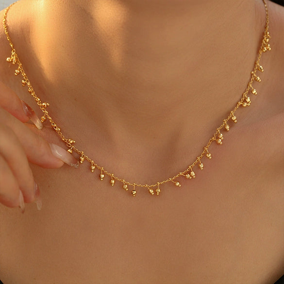 Wholesale Women's Light Luxury Geometric Copper And Titanium Steel Plated 18K Gold Round Ball Stitching Gourd Tassel Pendant Necklace