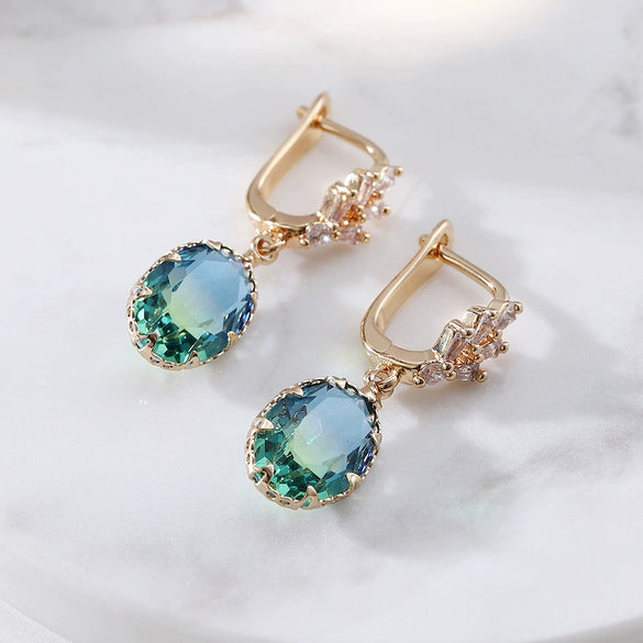 Wholesale Women's Light Luxury Geometric Copper Earrings With Oval Gem And Zircon Inlay And Electroplating Treatment