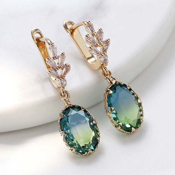 Wholesale Women's Light Luxury Geometric Copper Earrings With Oval Gem And Zircon Inlay And Electroplating Treatment