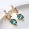 Wholesale Women's Light Luxury Geometric Copper Earrings With Oval Gem And Zircon Inlay And Electroplating Treatment