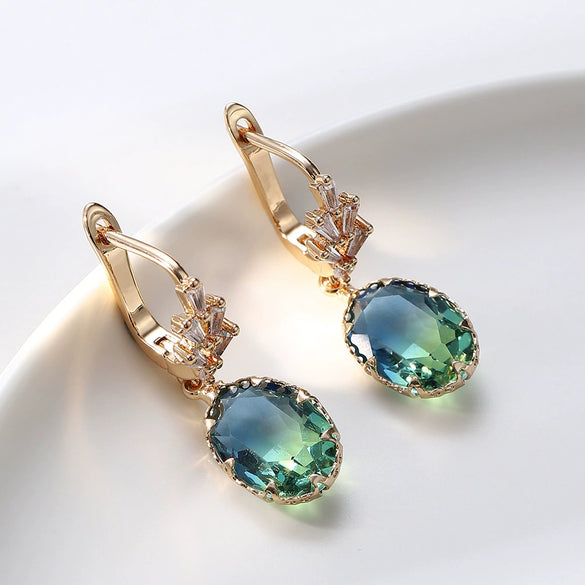 Wholesale Women's Light Luxury Geometric Copper Earrings With Oval Gem And Zircon Inlay And Electroplating Treatment