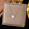 Wholesale Women's Light Luxury Geometric Heartshaped And Fourleaf Clover Stainless Steel Necklace With 18K Real Gold Plating