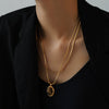 Wholesale Women's Light Luxury Geometric Pattern Oval Tiger Eye Stone Stainless Steel Electroplated Pendant Necklace For Autumn And Winter