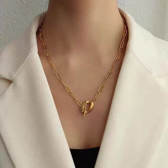 Wholesale Women's Light Luxury Geometric Pendant Necklace With Ot Buckle And Cross Chain Electroplated Titanium Steel Oval Design