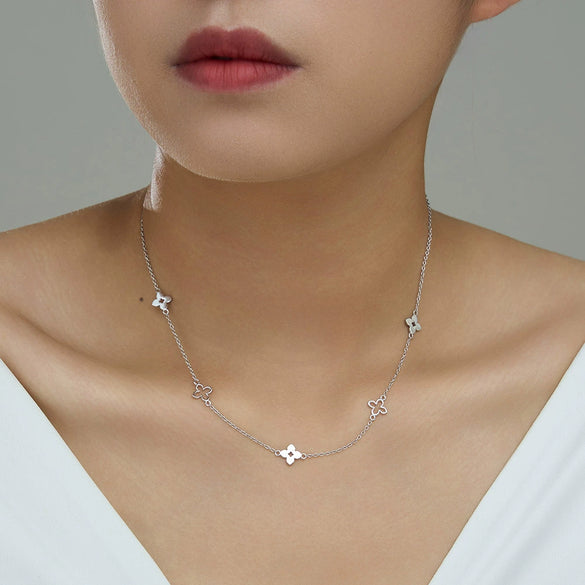 Wholesale Women's Light Luxury Geometric Silver Electroplated Cross Chain Necklace With Four Leaf Clover Pendant