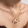 Wholesale Women's Light Luxury Geometric Stainless Steel Electroplated Oildrip Shell Pendant Necklace With Resin Beads And Tassels Layered Clavicle Chain Set