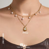 Wholesale Women's Light Luxury Geometric Stainless Steel Electroplated Oildrip Shell Pendant Necklace With Resin Beads And Tassels Layered Clavicle Chain Set