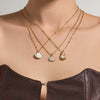 Wholesale Women's Light Luxury Geometric Stainless Steel Electroplated Oildrip Shell Pendant Necklace With Resin Beads And Tassels Layered Clavicle Chain Set