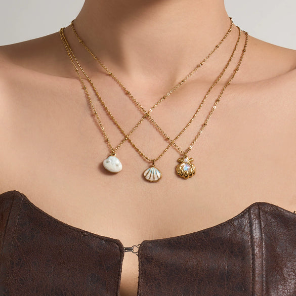 Wholesale Women's Light Luxury Geometric Stainless Steel Electroplated Oildrip Shell Pendant Necklace With Resin Beads And Tassels Layered Clavicle Chain Set
