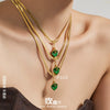 Wholesale Women's Light Luxury Geometric Stainless Steel Electroplated Snake Bone Chain Necklace With Green Leaf Pendant
