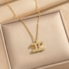 Wholesale Women's Light Luxury Gold Plated Arc De Triomphe Pendant Necklace With Copper Inlaid Zircon And Titanium Steel O Word Chain