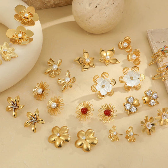 Wholesale Women's Light Luxury Highend Stainless Steel And Titanium Steel Earrings With Geometric Flowers And Pearl Design Electroplated