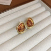 Wholesale Women's Light Luxury Resin Earrings With Geometric Heart Design And Electroplating