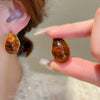 Wholesale Women's Light Luxury Resin Earrings With Geometric Heart Design And Electroplating