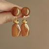 Wholesale Women's Light Luxury Resin Earrings With Geometric Heart Design And Electroplating