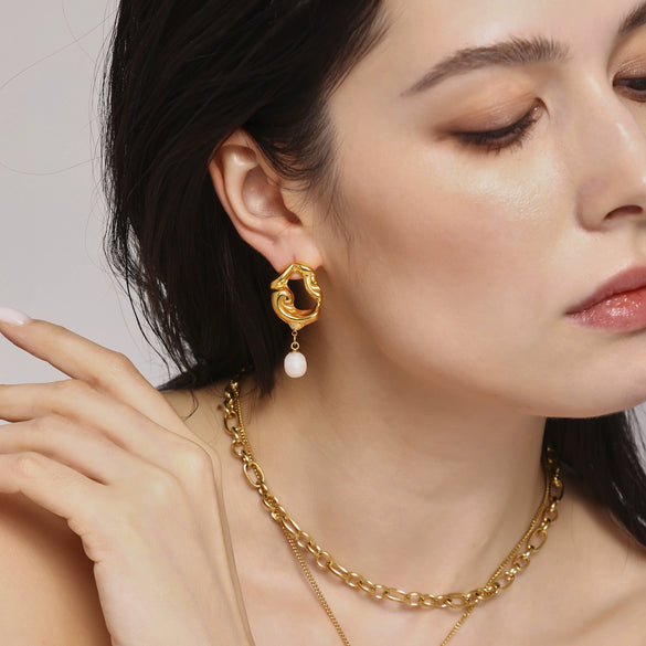 Wholesale Women's Light Luxury 316L Stainless Steel And Freshwater Pearl Geometric Hollow Lava Irregular Plated Pendant Earrings