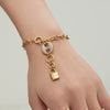 Wholesale Women's Light Luxury Stainless Steel And Zircon Pig Nose Lock Tassel Pendant 18K Real Gold Plated Necklace And Bracelet Set