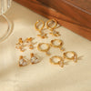 Wholesale Women's Light Luxury Stainless Steel Earrings With Zircon Inlay Starfish Clover Animal Zodiac Design