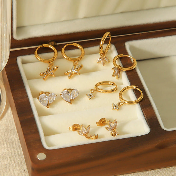 Wholesale Women's Light Luxury Stainless Steel Earrings With Zircon Inlay Starfish Clover Animal Zodiac Design